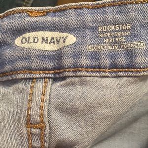 Old navy blue ripped jeans